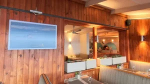 dixies restaurant view of pizza ovens with photo of roman rock lighthouse in foreground